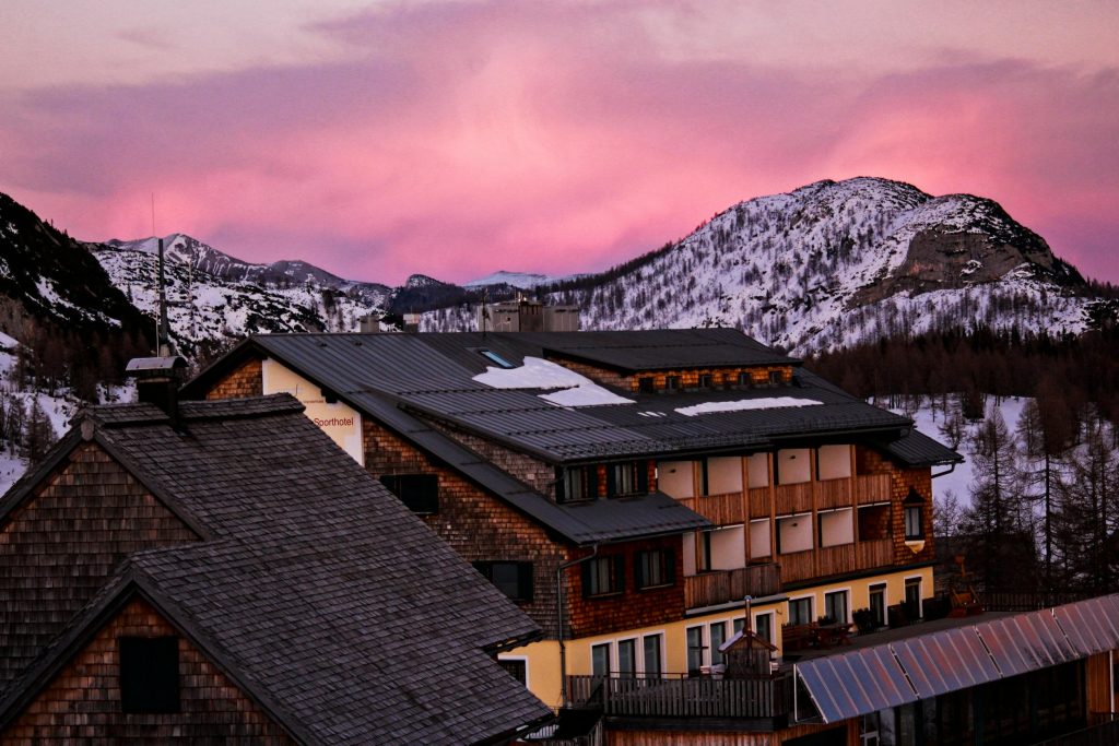 An image of one of the The Best All-Inclusive Hotels in Austria with mountains in the surroundings